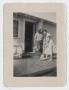 Primary view of [Photograph of a Couple Cleaning the House]