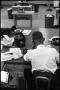 Primary view of [Man Working at Desk at Beaumont Enterprise #20]