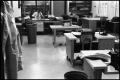 Photograph: [Man Working at Desk at Beaumont Enterprise #16]