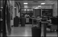 Photograph: [Man Working at Desk at Beaumont Enterprise #12]
