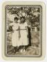 Photograph: [Photograph of Two Woman Posing Outside]