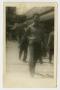Postcard: [Photograph of Young Man Walking]