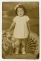 Photograph: [Portrait of Girl Posing on a Chair]
