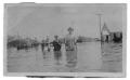 Photograph: [People Standing in Flooded Street]