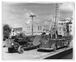 Photograph: [Old and New Fire Trucks]