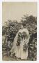 Photograph: [Photograph of Woman with Flowers]