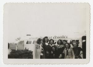 Primary view of object titled '[Photograph of Women and Bus]'.