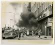 Photograph: [Smoke Pours From Dallas Federal Savings & Loan Building]