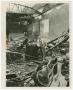 Photograph: [Man Standing In Rubble of Burned Kessler Theatre]