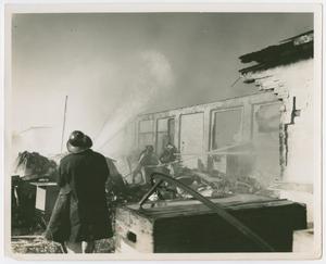 Primary view of object titled '[Firefighters Fight Love Field Hangar Fire]'.