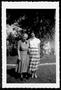 Photograph: [Photograph of Mamie Davis George (left) standing next to an unidenti…
