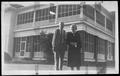 Primary view of [Albert Peyton George and Mamie George standing in the yard of the George home]
