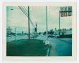 Photograph: [Curb view of Denton Center Dry Cleaners on W. University Drive]