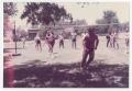 Photograph: [City of Denton employees playing volleyball in the park]