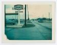 Thumbnail image of item number 1 in: '[Chism Texaco service sign on W. University Drive]'.