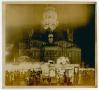 Photograph: [Photograph of Ellis County Courthouse and Carnival at Night]