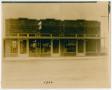 Photograph: [Photograph of Desmond's Grocery Storefront]