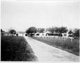 Photograph: [The dirt driveway leading to the George house]