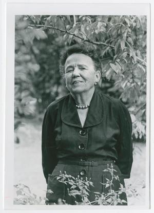 Primary view of object titled '[Photograph of Edith M. Bonnet in a Thicket of Trees]'.