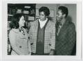 Thumbnail image of item number 1 in: '[Mary Celeste Pickron, Barbara Jordan, and an Unidentified Man Meet in an Office]'.