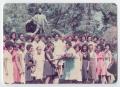Photograph: [Barbara Jordan Being Handed a Bouquet of Flowers at the Tuskegee Ins…