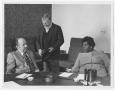 Photograph: [Barbara Jordan and Two Unidentified Men at a Round Table]