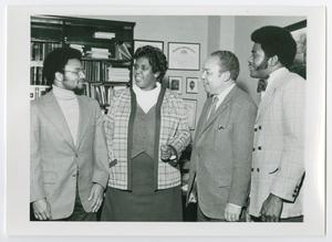 Primary view of object titled '[Marvin Cannon, Barbara Jordan, Harold N. Stinson, and Samuel Brown Meeting in an Office]'.