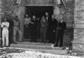 Photograph: [Nine Men in Front of Shelton Chapel]