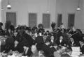 Photograph: [Group of People Eating at a Banquet]