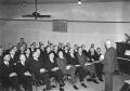 Photograph: [Group of Men in Worship Listening to a Sermon]