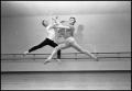 Photograph: [Two Male Ballet Dancers Mid-Air Positions]