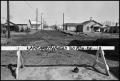 Photograph: [Blocked Torn Up Road in Housing Development]
