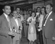Photograph: [Men Drinking Beer at a Wedding]