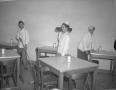 Photograph: [Workers Cleaning the Milam Cafeteria]