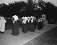 Primary view of [Nuns Walking at a May Day Procession at Seton Hospital]