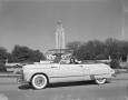 Photograph: [Woman Sitting in a Convertible]