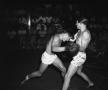 Photograph: [Two Men Boxing at a Fight Night at St. Edward's University]