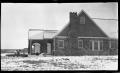 Photograph: [Photograph of Stone House in Snow]
