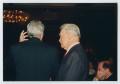 Photograph: [Cactus Pryor with Unidentified Man at Caritas Dinner]