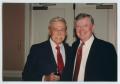 Primary view of [Cactus Pryor and Darrell Royal at Caritas Dinner]