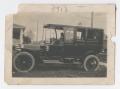 Photograph: [Photograph of Automobile Parked on Lawn]