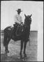 Primary view of [Postcard image of a man on horseback]