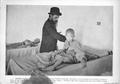 Photograph: [A man ministering to a young boy in a hospital bed]