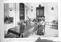 Photograph: [A family of six sitting around a long table]