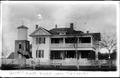 Postcard: [The George Ranch house and cistern house]