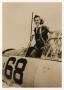 Photograph: [WASP Standing in a Cockpit]