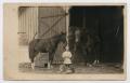 Primary view of [Postcard Picturing Pearl Draper With Barn Animals]