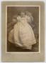 Thumbnail image of item number 1 in: '[Photograph of an Infant in a Large Dress]'.