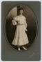 Photograph: [Photograph of a Young Woman in a White dress]