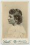 Photograph: [Portraits of a Woman From Behind Her Shoulder]